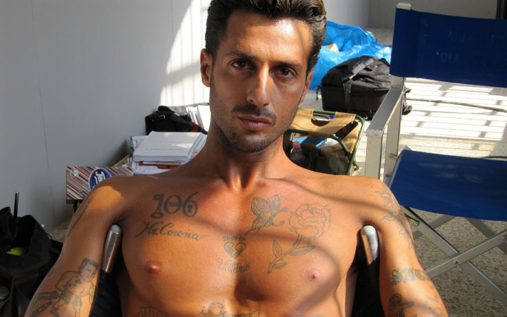Foto di Fabrizio Corona che attacca Belen