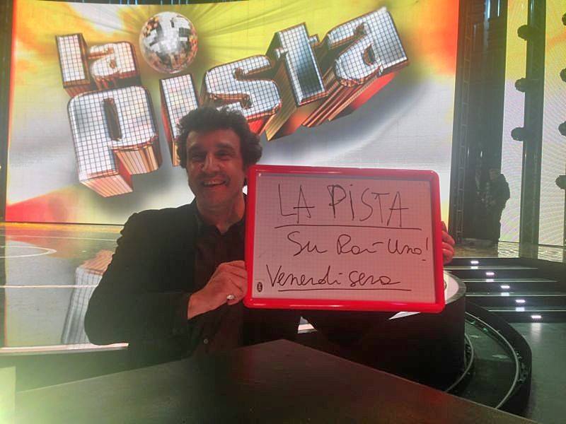 foto di flavio insinna la pista