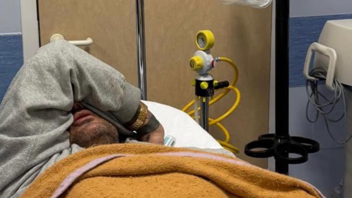 foto fabrizio corona letto ospedale