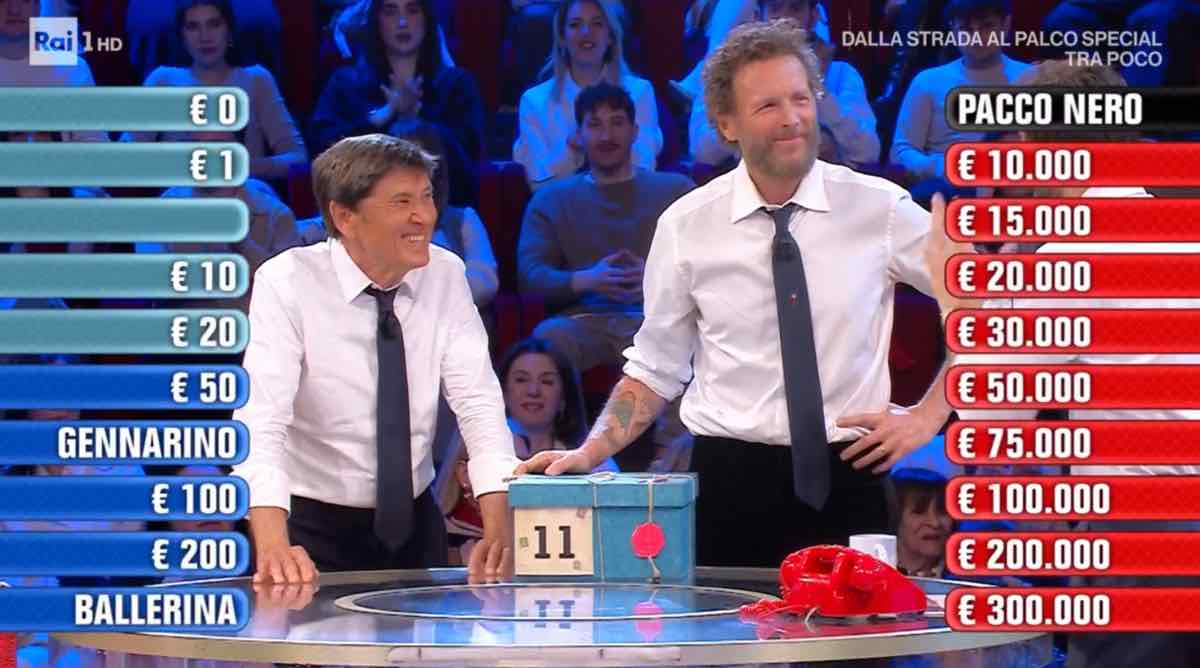 foto Gianni Morandi Jovanotti Affari Tuoi 