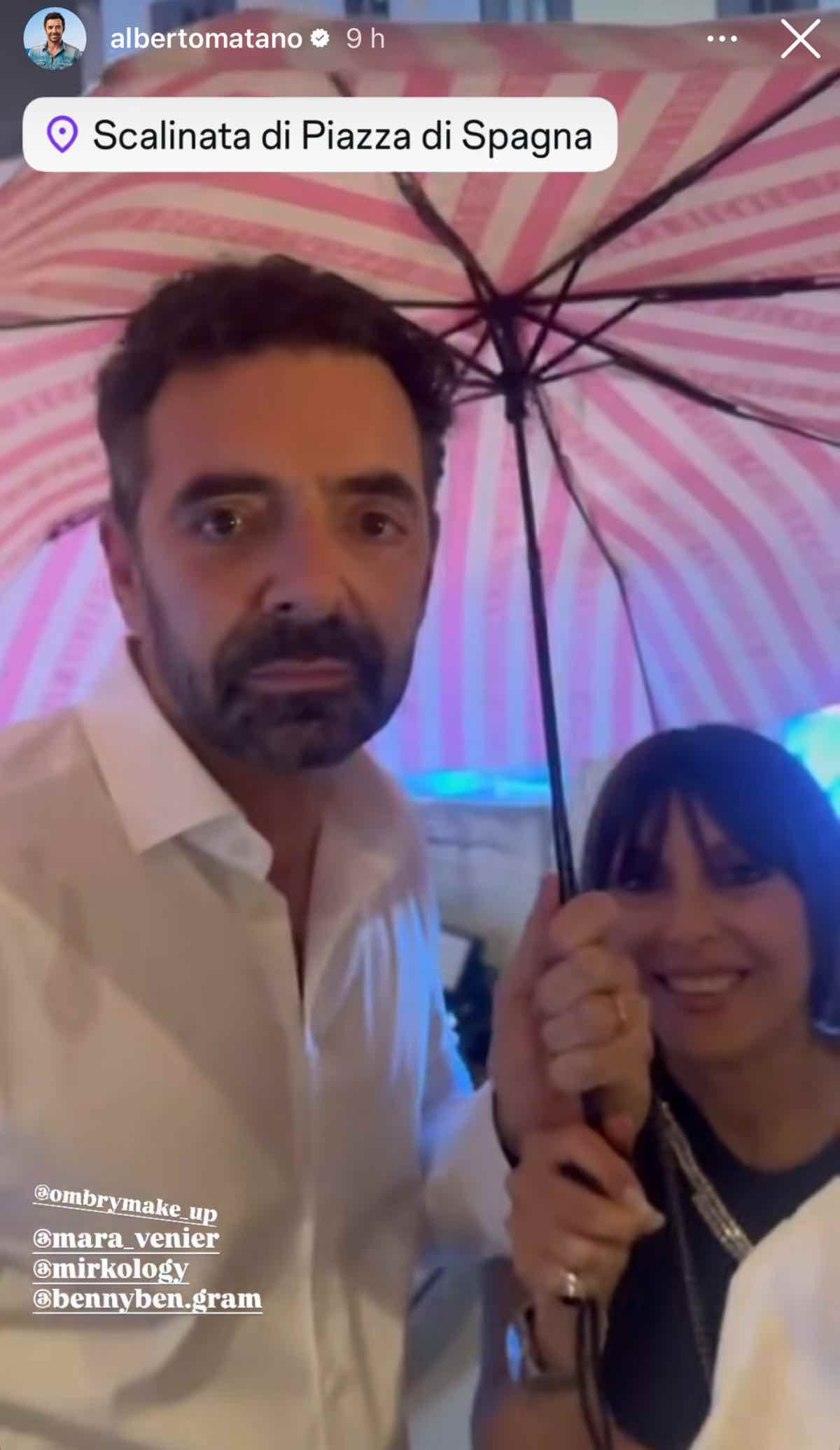 foto alberto matano sotto al diluvio